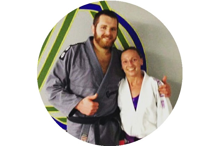 Heather after receiving her purple belt in Brazilian Jiu Jitsu