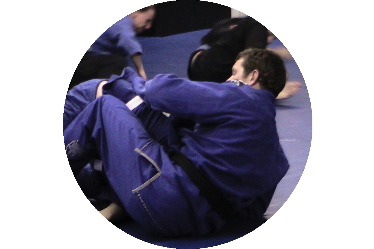 Martial arts students sparring or rolling as it is called in Brazilian Jiu Jitsu